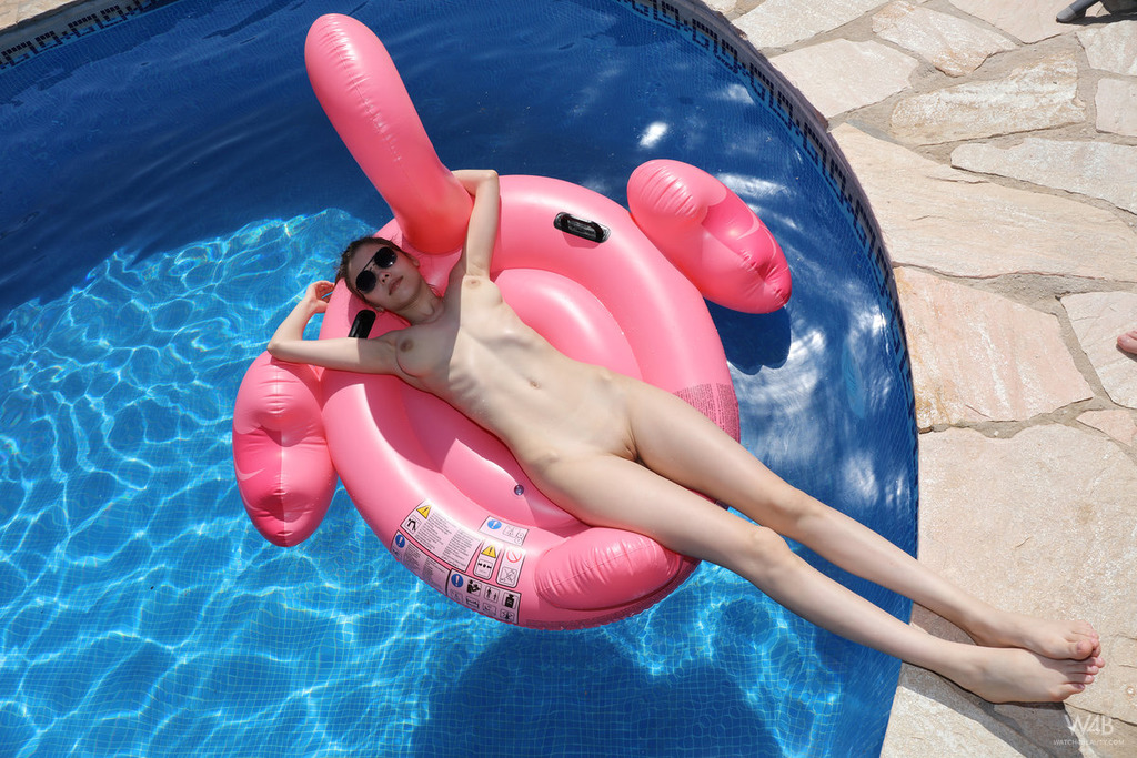 Milla Shows Herself Off At The Pool 15